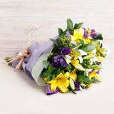 35. RAMO DE FLORES SURTIDO EN MORADO